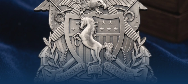 Detailed antique silver collectible coin displaying a rearing horse on a shield below an eagle and the motto "Sursum Ab Ordine.
